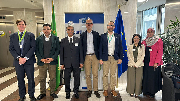 A group photo for the members of the delegation with representatives from the European Commission's Directorate General for Environment.